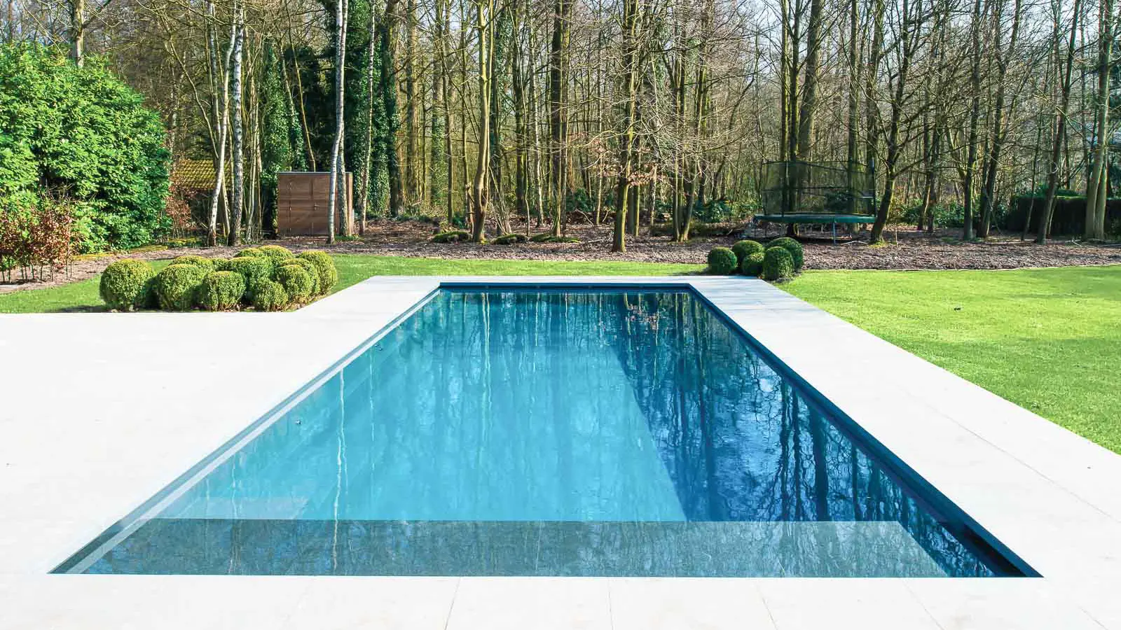 The Cube™ with Cover, a fiberglass pool design manufactured by Leisure Pools