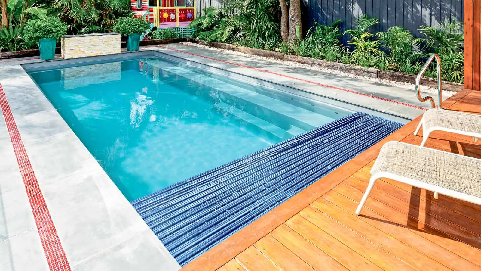 The Reflection™ with Cover, a fiberglass pool design manufactured by Leisure Pools